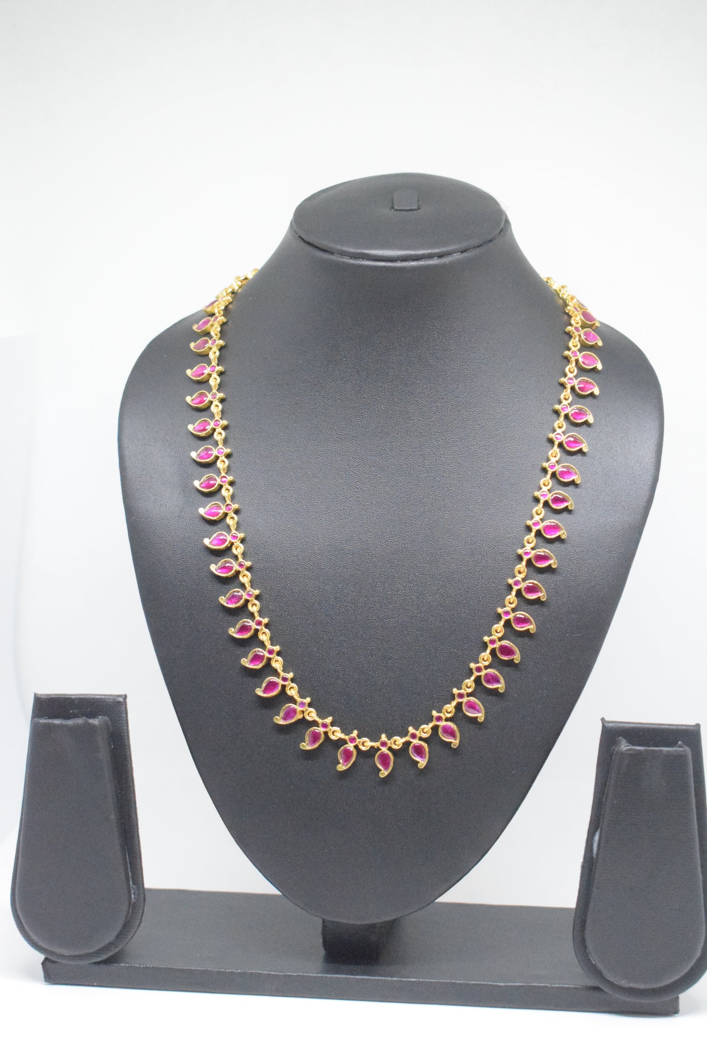 Jadau kundan long mango ruby haram.